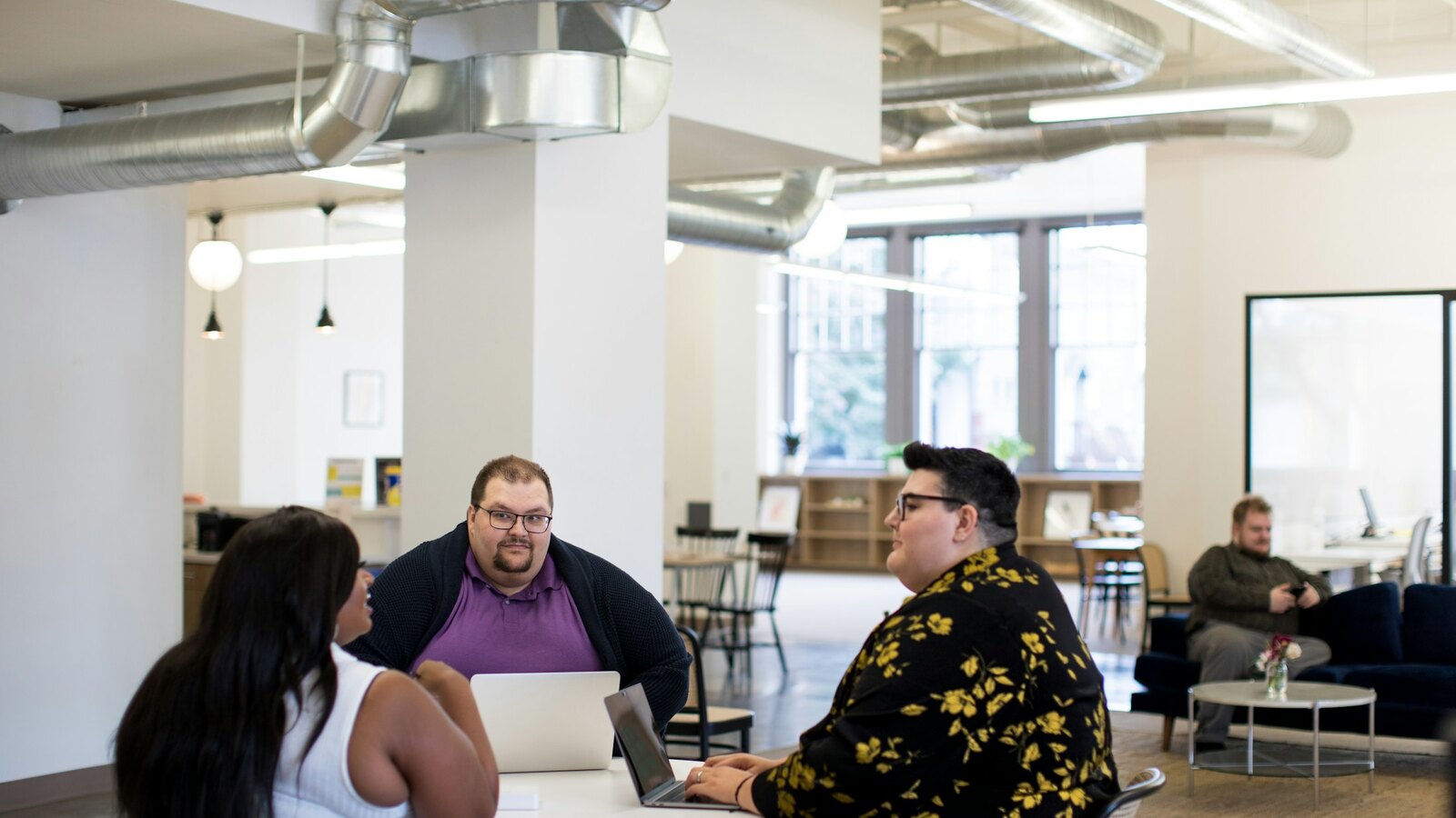 Professionals collaborating in a bright office