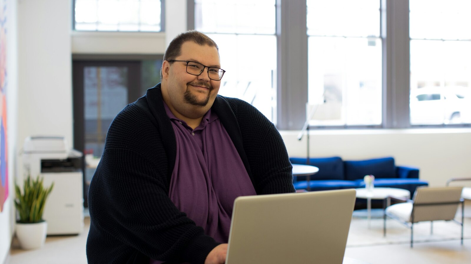 Software developer working at multiple monitors